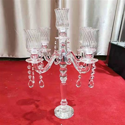 Lysestager i glas af kandelaber